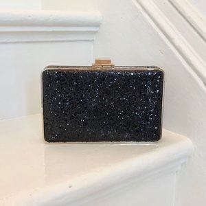 Henri Bendel black glitter and gold clutch
